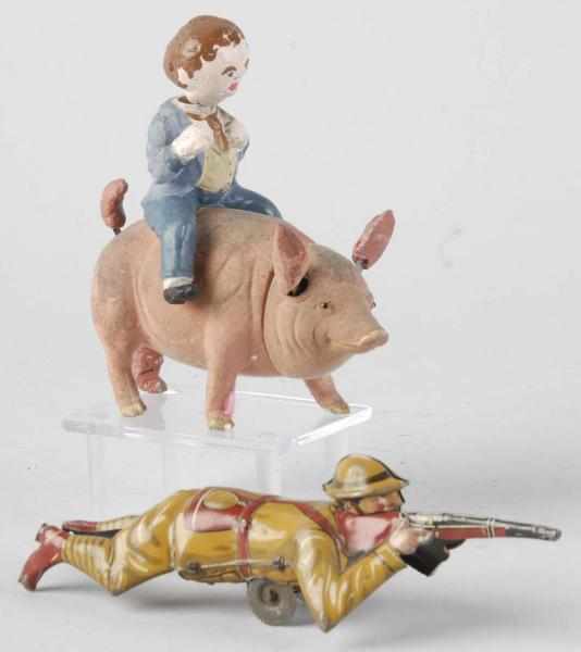 Appraisal: Lot of Vintage Toy Items Description Includes one man riding