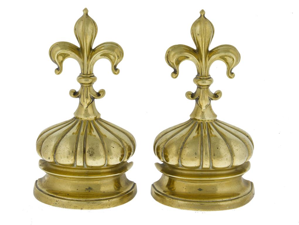 Appraisal: A PAIR OF VICTORIAN BRASS DOOR PORTERS of fleur de