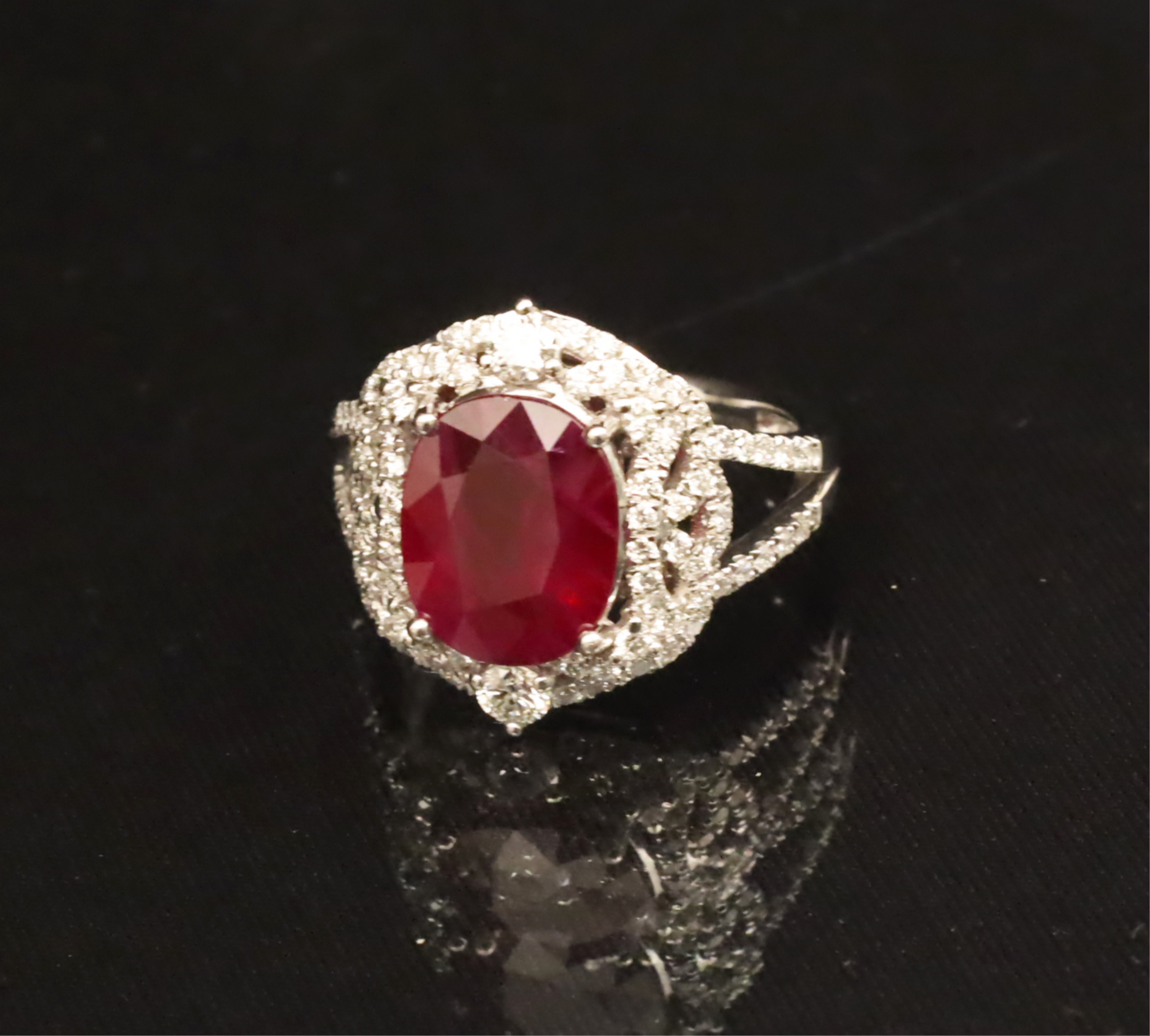 Appraisal: PLATINUM BURMESE RUBY AND DIAMOND RING W GIA Platinum Burmese