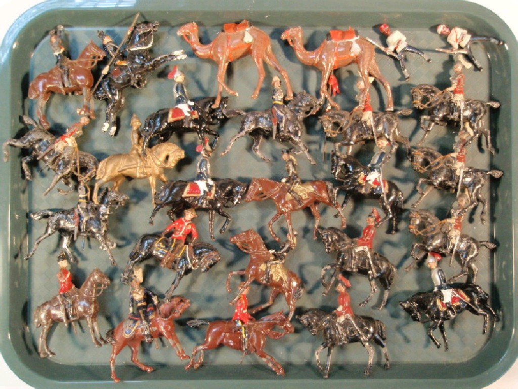 Appraisal: Britains and other vintage lead soldiers including various mounted cavalry