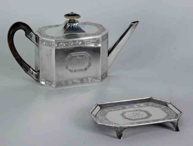 Appraisal: A George III silver teapot and stand Henry Cowper or