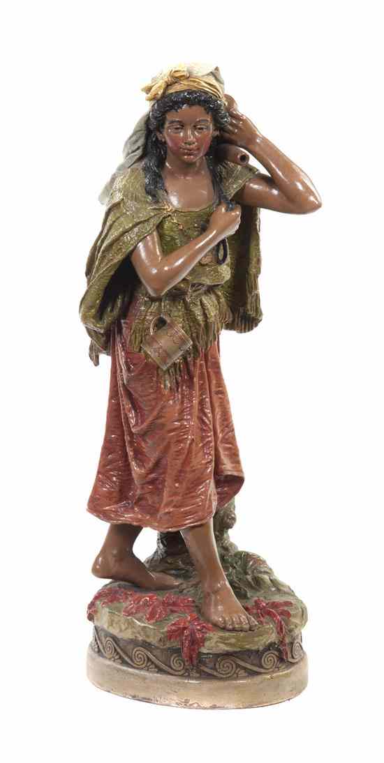 Appraisal: A Cast Plaster Figure depicting a maiden carrying water raised