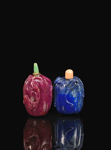 Appraisal: Two snuff bottles The first a ruby-colored hardstone snuff bottle