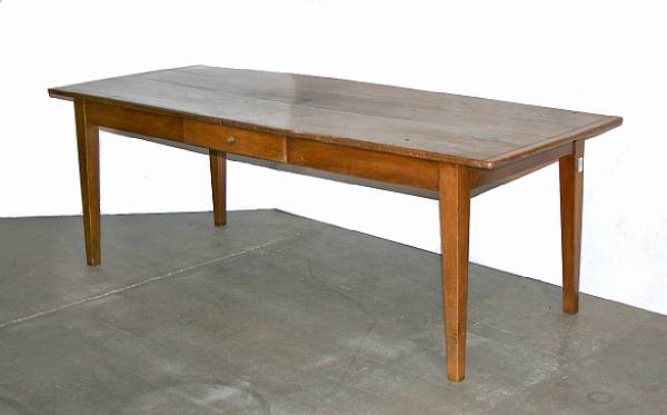 Appraisal: A French fruitwood farm table partially composed of antique elements