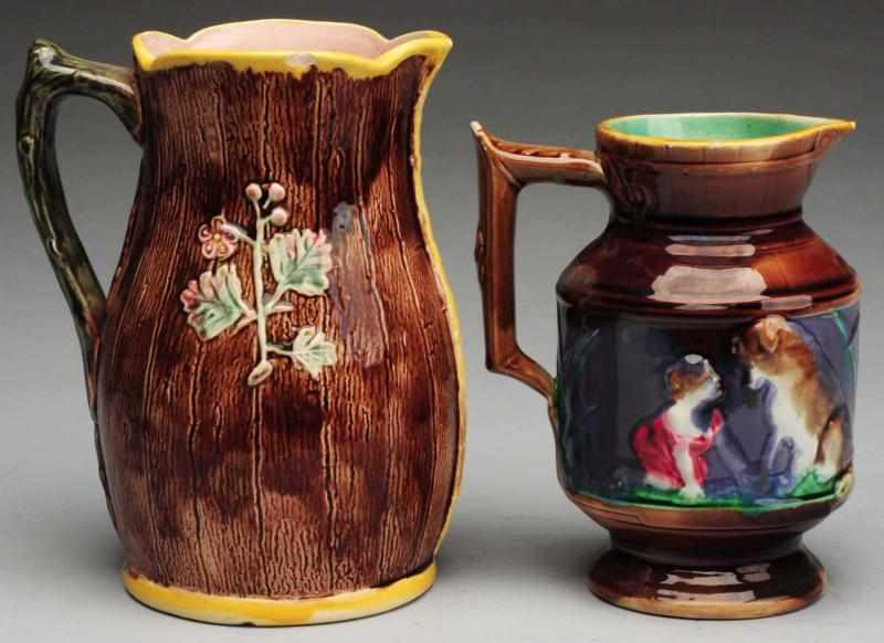 Appraisal: Pair of th Century Majolica Water Pitchers Includes one decorated