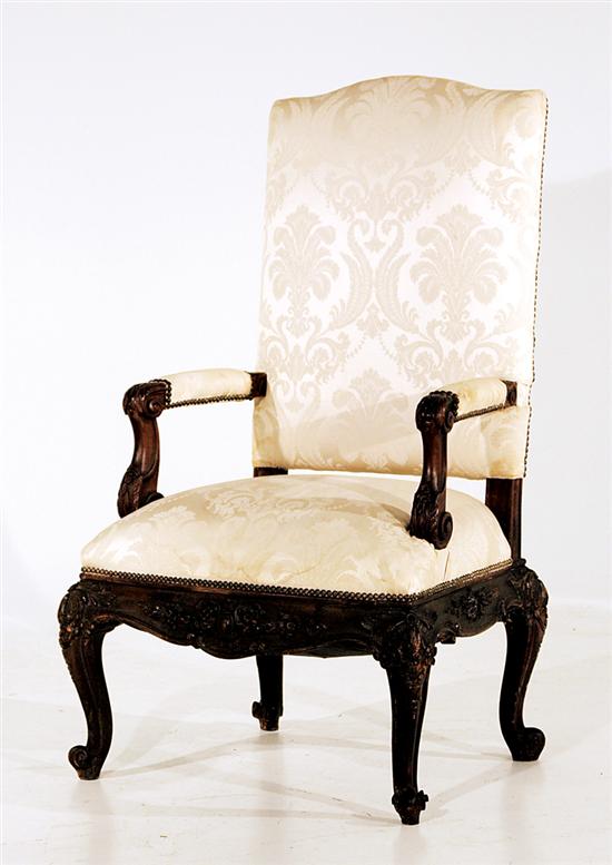 Appraisal: Continental carved mahogany armchair second half th century serpentine crest