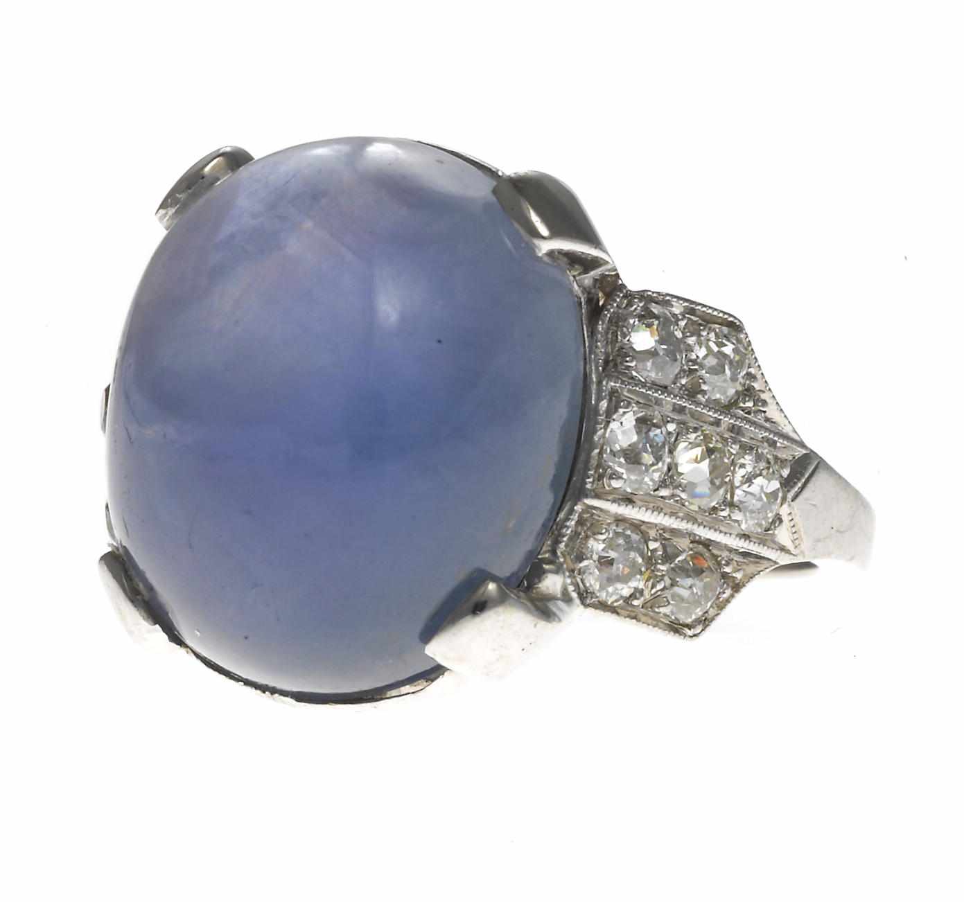 Appraisal: An art deco star sapphire and diamond ring oval-shaped star