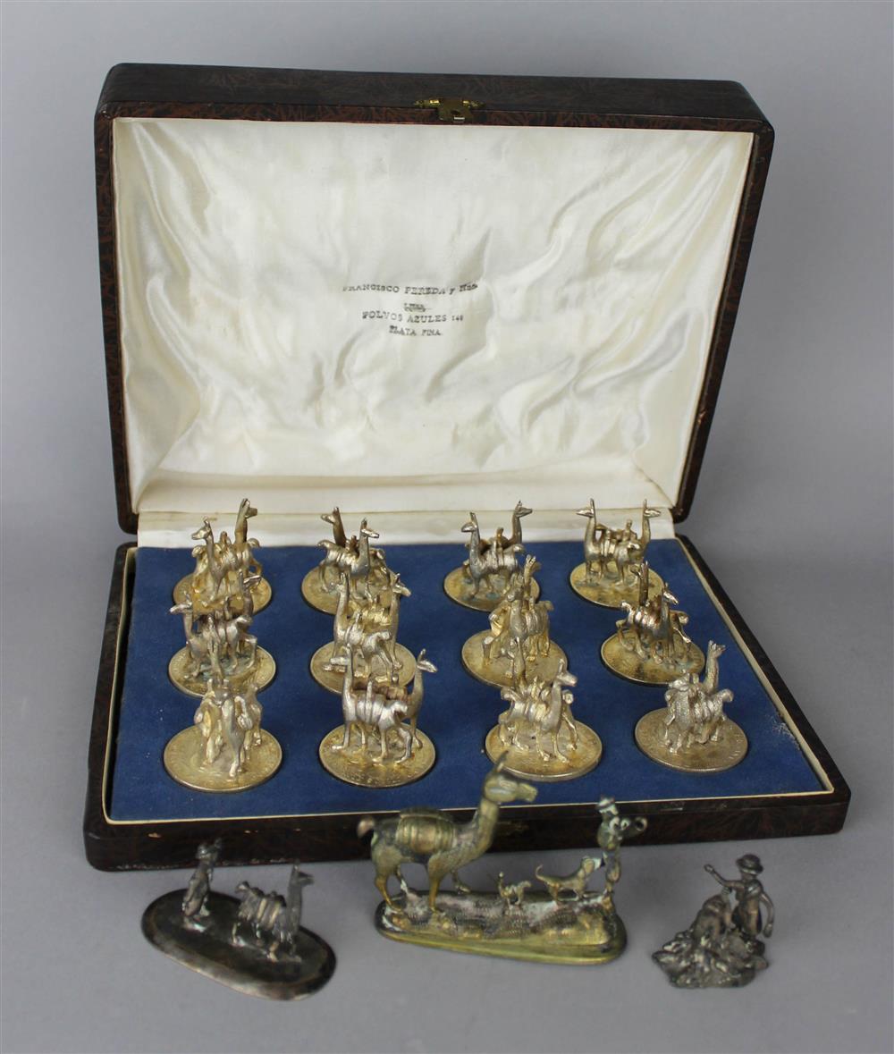 Appraisal: SET OF TWELVE CASED PERUVIAN SILVER PLACE CARD HOLDERS the