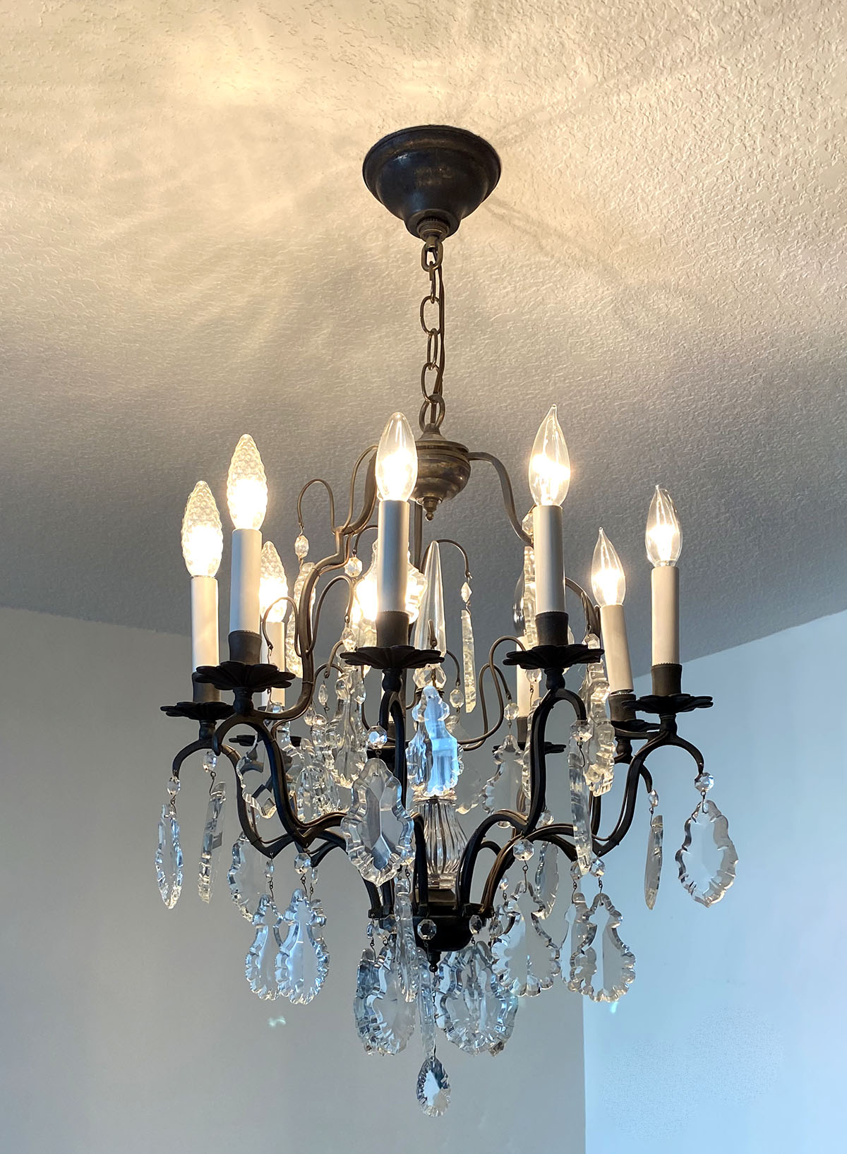 Appraisal: BACCARAT FACETED CRYSTAL CHANDELIER - light Baccarat chandelier having scrolling