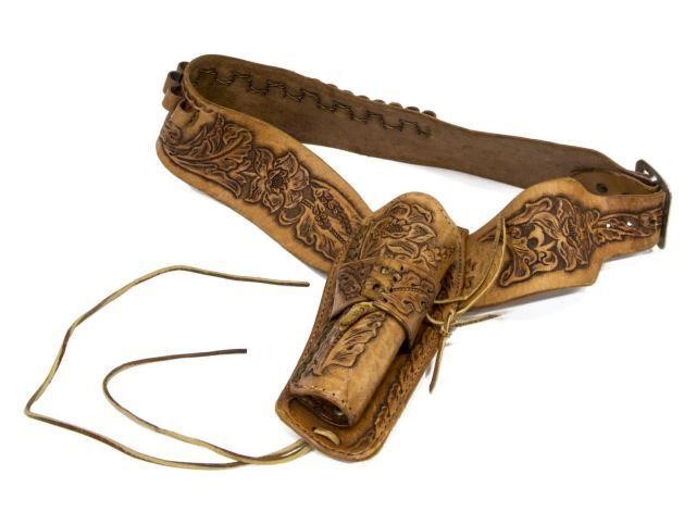 Appraisal: Hand-tooled leather pistol holster and cartridge belt Ben Bilt caliber