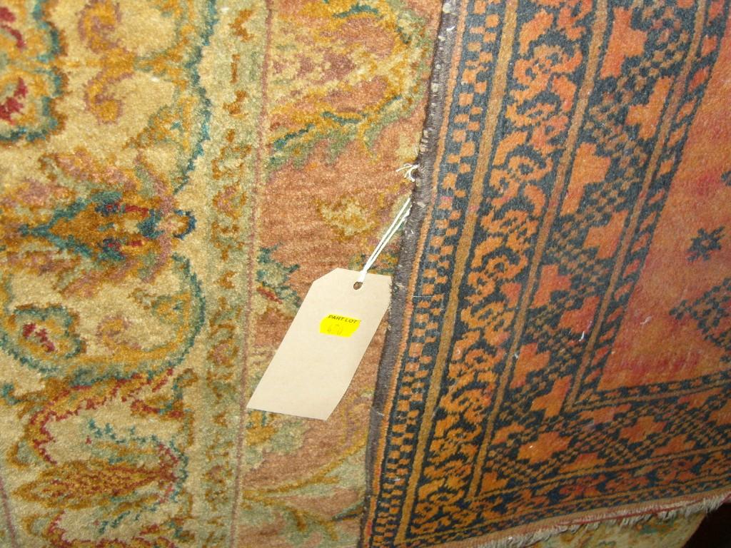 Appraisal: A small cream ground eastern wool rug with floral decoration