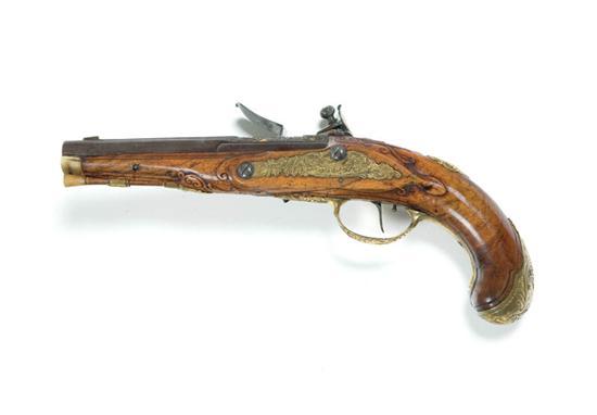 Appraisal: FLINTLOCK PISTOL European mid th century Well-executed rococo style relief