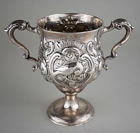 Appraisal: IRISH GEORGE III SILVER REPOUSSE TWO-HANDLED CUPDublin Matthew West The