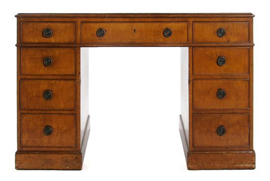 Appraisal: An English Chippendale Style Walnut Pedestal Desk raised upon two