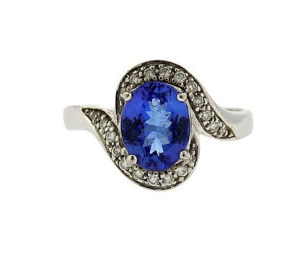 Appraisal: K Gold Diamond Tanzanite Ring METAL K gold GEMSTONES tanzanite