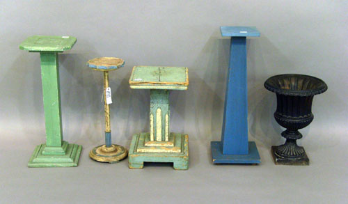 Appraisal: Four painted pedestals together with a cast iron urn