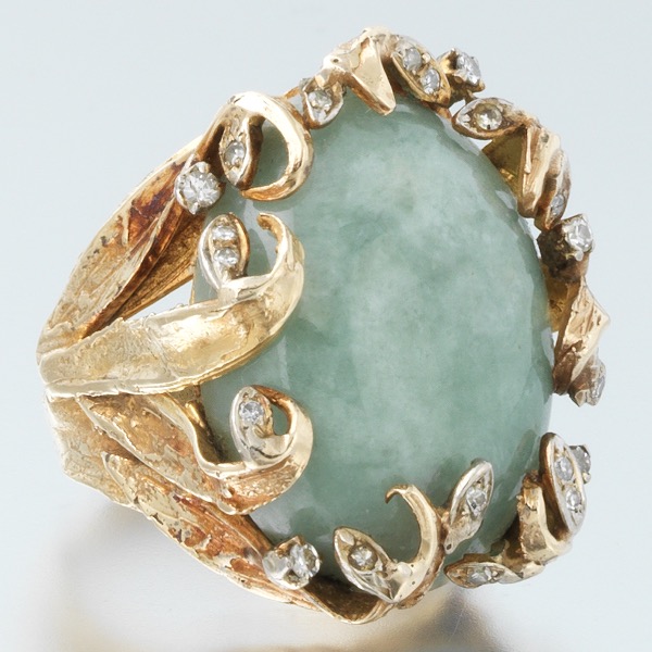 Appraisal: LADIES' JADE AND DIAMOND RING Ring size Large jade cabochon