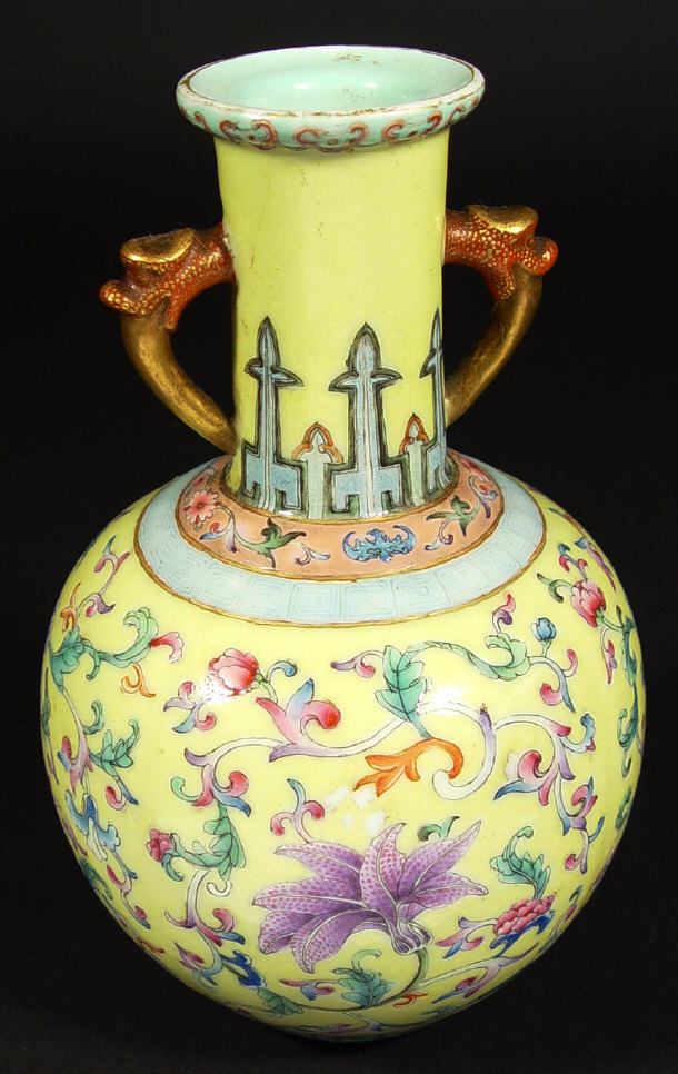 Appraisal: Chinese yellow ground vase with serpents head handles the body