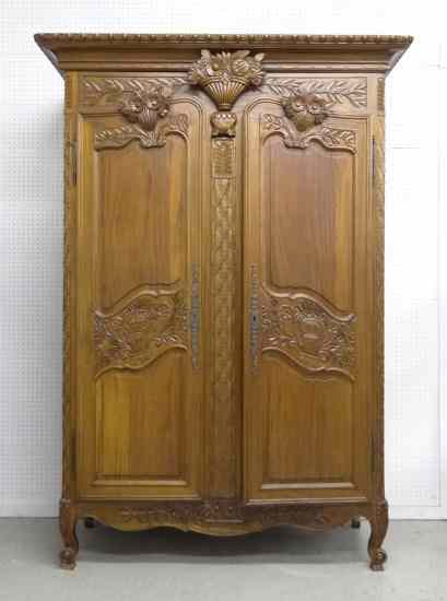 Appraisal: Contemporary two door carved armoire with removable crest Cornice ''