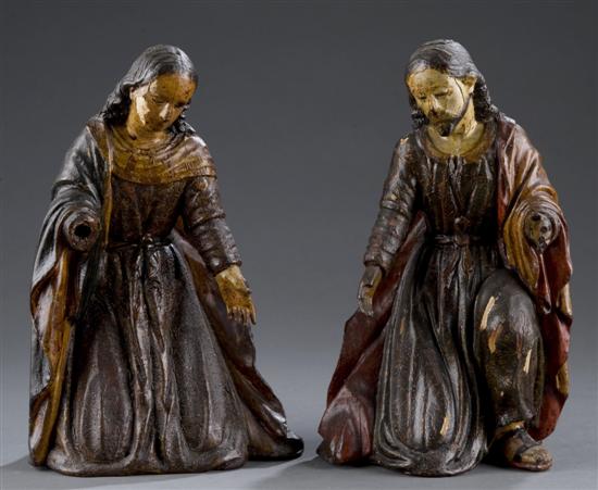 Appraisal: Two hand carved wood and polychrome Santos figures of Mary