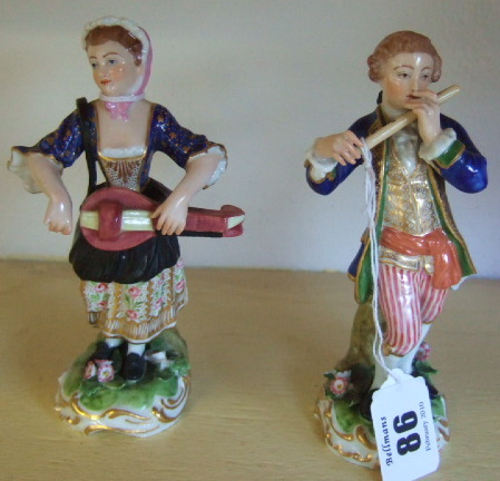 Appraisal: A pair of Sampson figures th century modelled as male