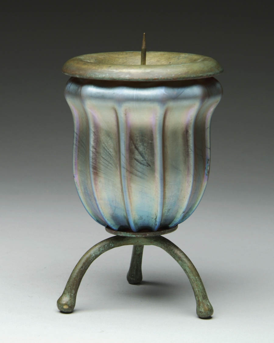 Appraisal: ART GLASS CANDLEHOLDER Iridescent gold with blue highlights and bronze