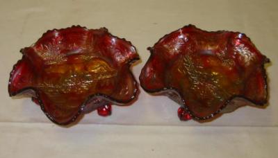 Appraisal: A PAIR OF RED CARNIVAL GLASS DISHES of frilled circular