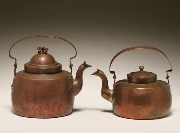 Appraisal: Two early copper teapots both dovetailed swivel handles one initialed