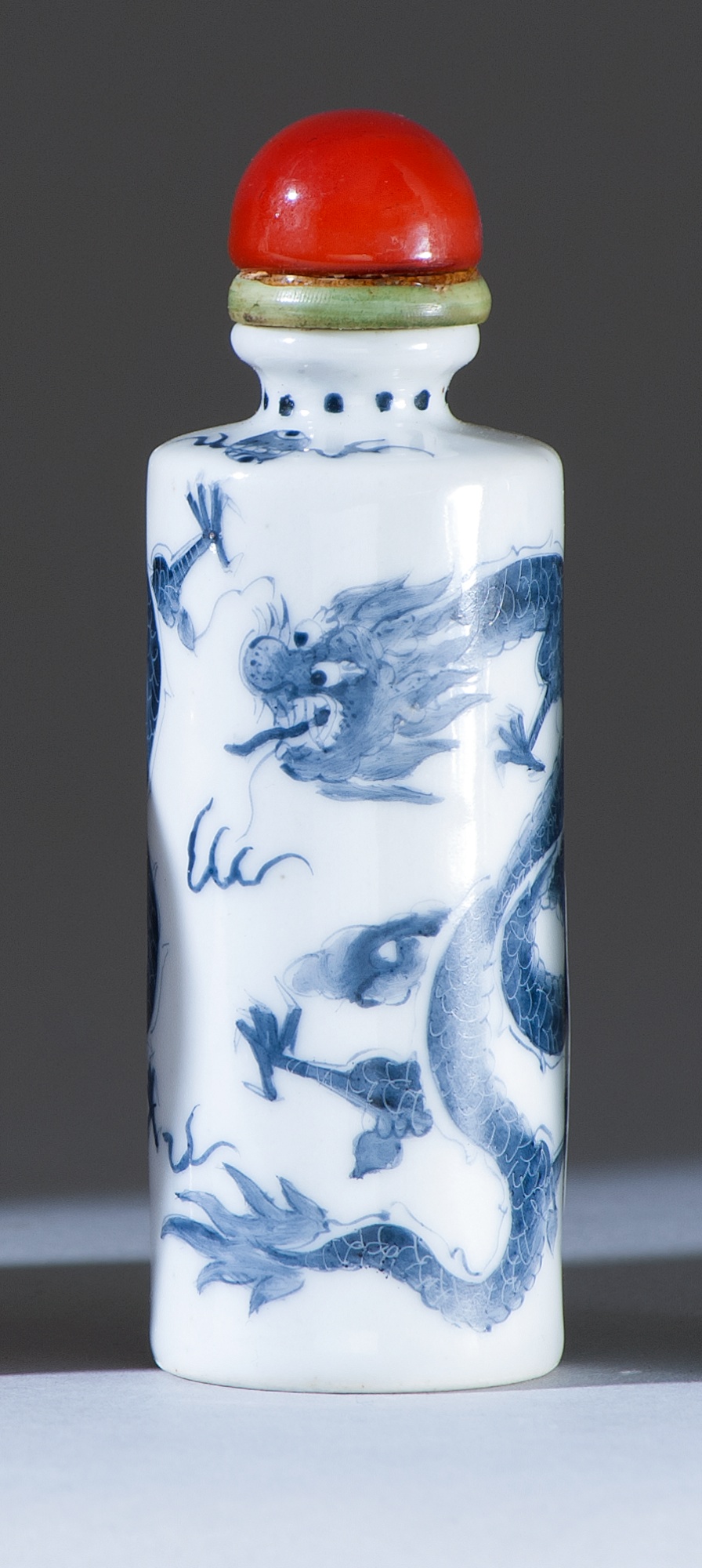 Appraisal: PORCELAIN SNUFF BOTTLE Circa With blue glaze dragon design on