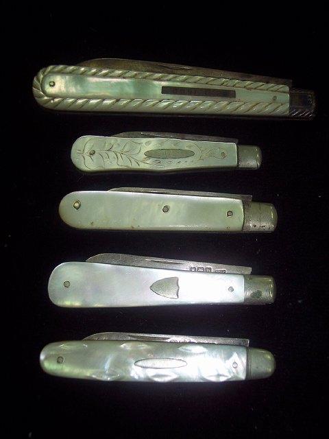 Appraisal: A pocket knife with mother-of-pearl handle and silver blade H