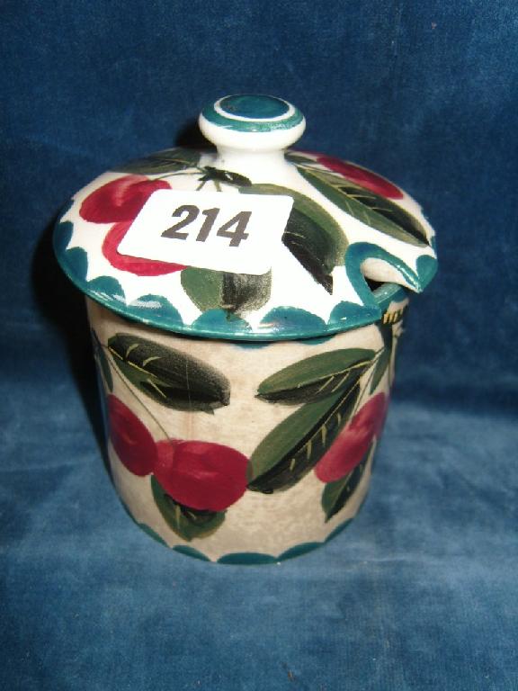 Appraisal: A Wemyss jam pot and cover of cylindrical form with