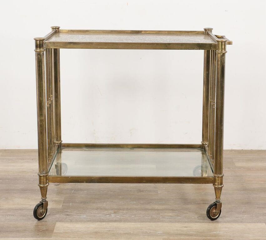 Appraisal: Hollywood Regency style bar cart in the style of Baker