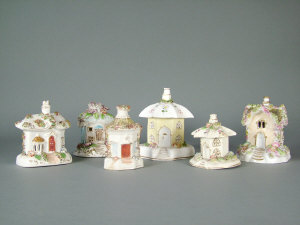 Appraisal: Five Staffordshire cottage pastel burners two with umbrella shaped rooves