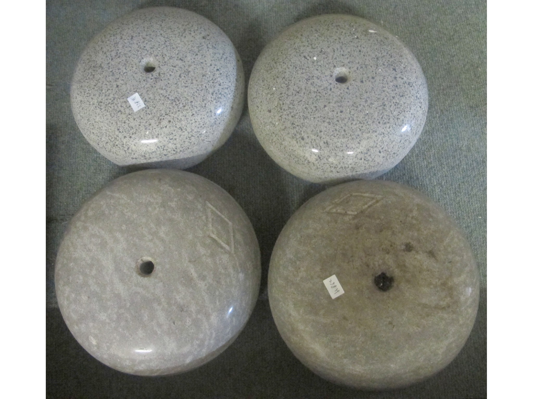 Appraisal: Four curling stones