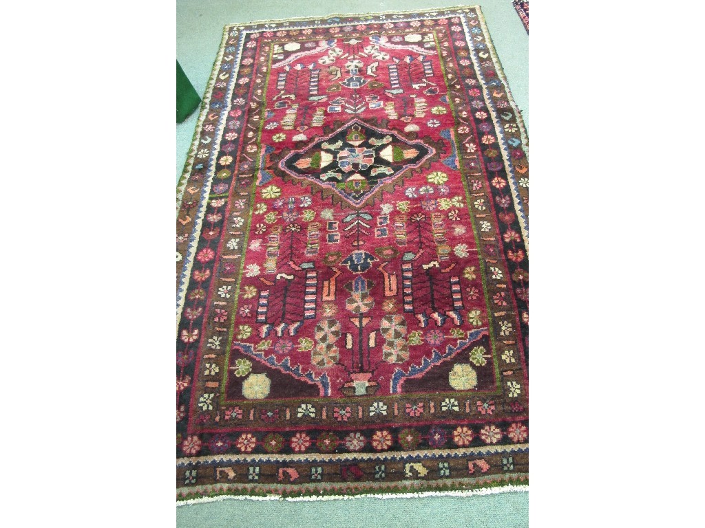 Appraisal: Hamadan multi coloured floor rug