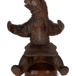 Appraisal: A Swiss Black Forest Bear-form Carved Chair Circa Height x