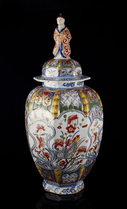 Appraisal: EARLY DUTCH FAIENCE POLYCHROME COVERED JAR Oriental motifs with figural