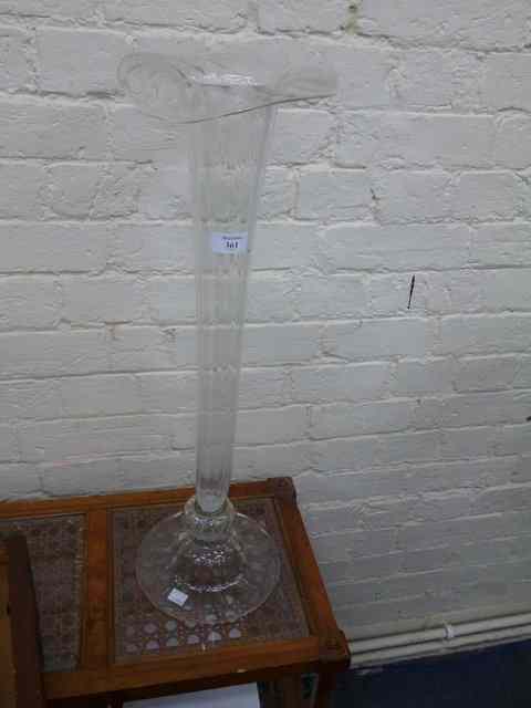 Appraisal: A TALL GLASS TRUMPET SHAPED VASE on a spreading circular