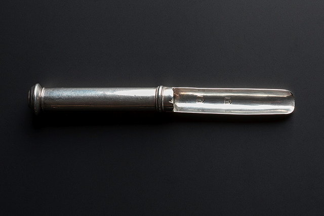 Appraisal: A SILVER APPLE CORER c - cylindrical 'Cannon' style handle