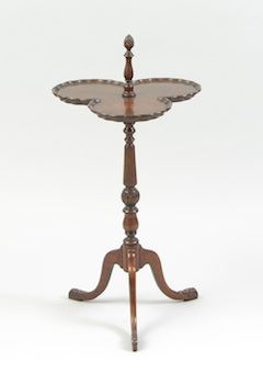 Appraisal: A Three Leaf Clover Wine Stand A mahogany finish three