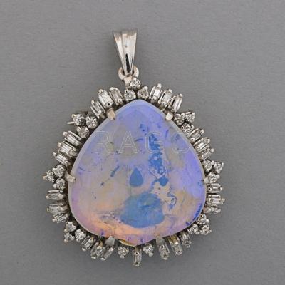 Appraisal: CRYSTAL OPAL AND DIAMOND PENDANT BROOCH Spade-shaped opal approx cts