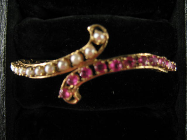 Appraisal: Ruby Pearl Bangle Bracelet carats of rubies and pearls in