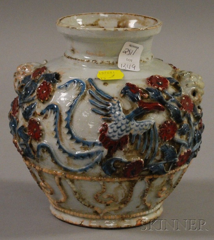 Appraisal: Chinese Porcelain Jar the ovoid body with mold design painted