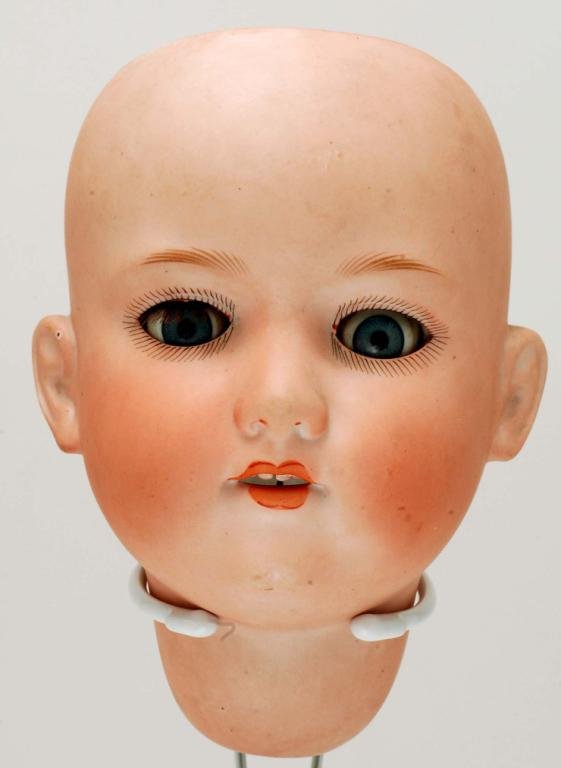 Appraisal: A large bisque doll head by Armand Marseille Marked to