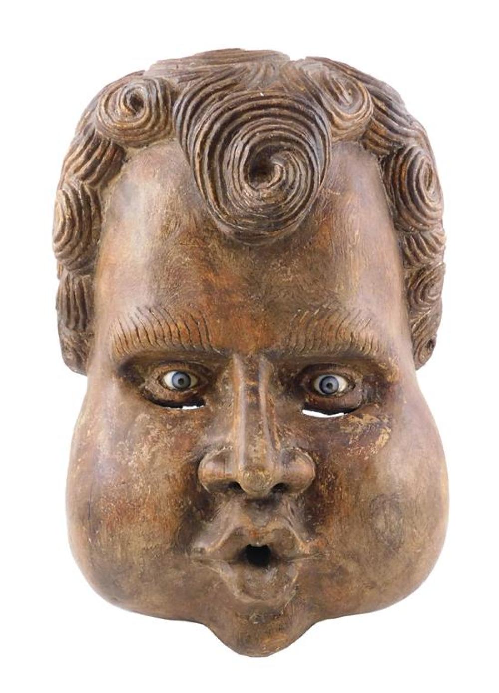 Appraisal: Carved wooden mask of man with blue glass eyes late