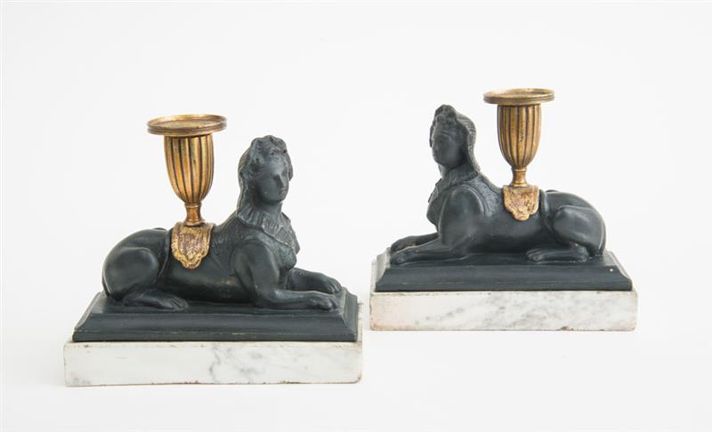 Appraisal: PAIR OF REGENCY SPHINX-FORM GILT AND VERTE ANTICO PLASTER CANDLE