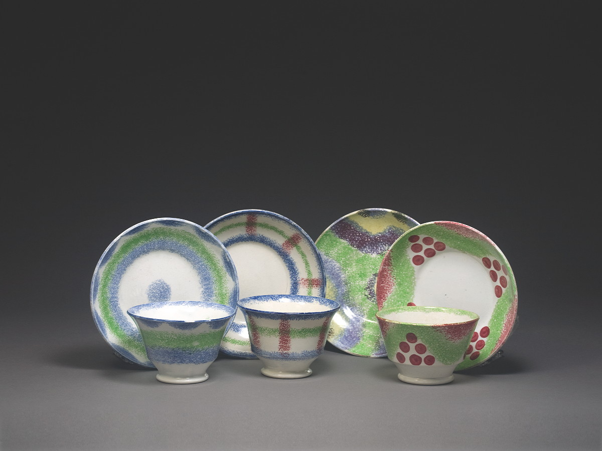 Appraisal: THREE STAFFORDSHIRE SPATTERWARE TEABOWLS AND SAUCERS AND A RARE SAUCER