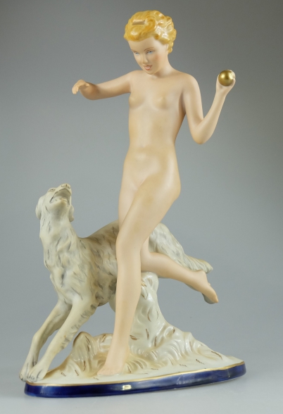 Appraisal: Royal Dux figure of a nude girl running with dog