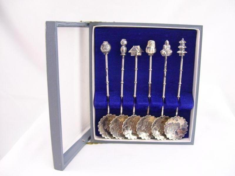 Appraisal: Sterling Figural Teaspoons in Case Six sterling figural teaspoons representing