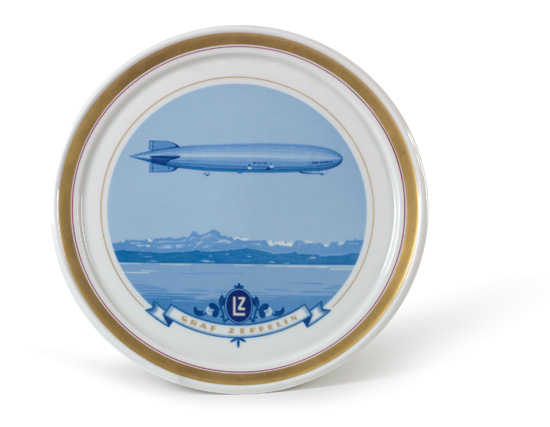 Appraisal: ZEPPELIN Graf Zeppelin Commemorative plate picturing the zeppelin diameter rimmed